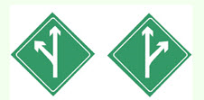 图中标志是分流诱导标志，表示前方有分流车道，车辆应按箭头方向直行或驶出主车道。 此题为判断题(对，错