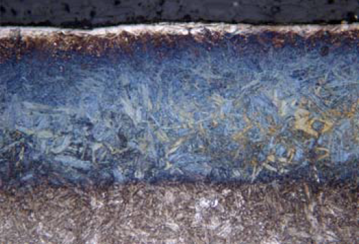 金相照片中蓝色部分的是某零件表面硬化层（氮化），厚度约为0.35mm，某工程师采用hrc去测量硬化层